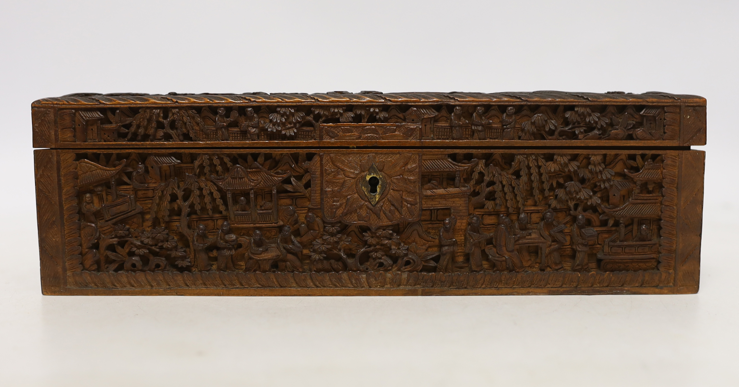 A 19th century Chinese carved boxwood box, an amboyna cigarette box and three others